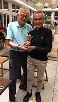 Net Score Champion Cheung Suk Chien (right), receiving prize from Dr John Chan, former Dean of Science